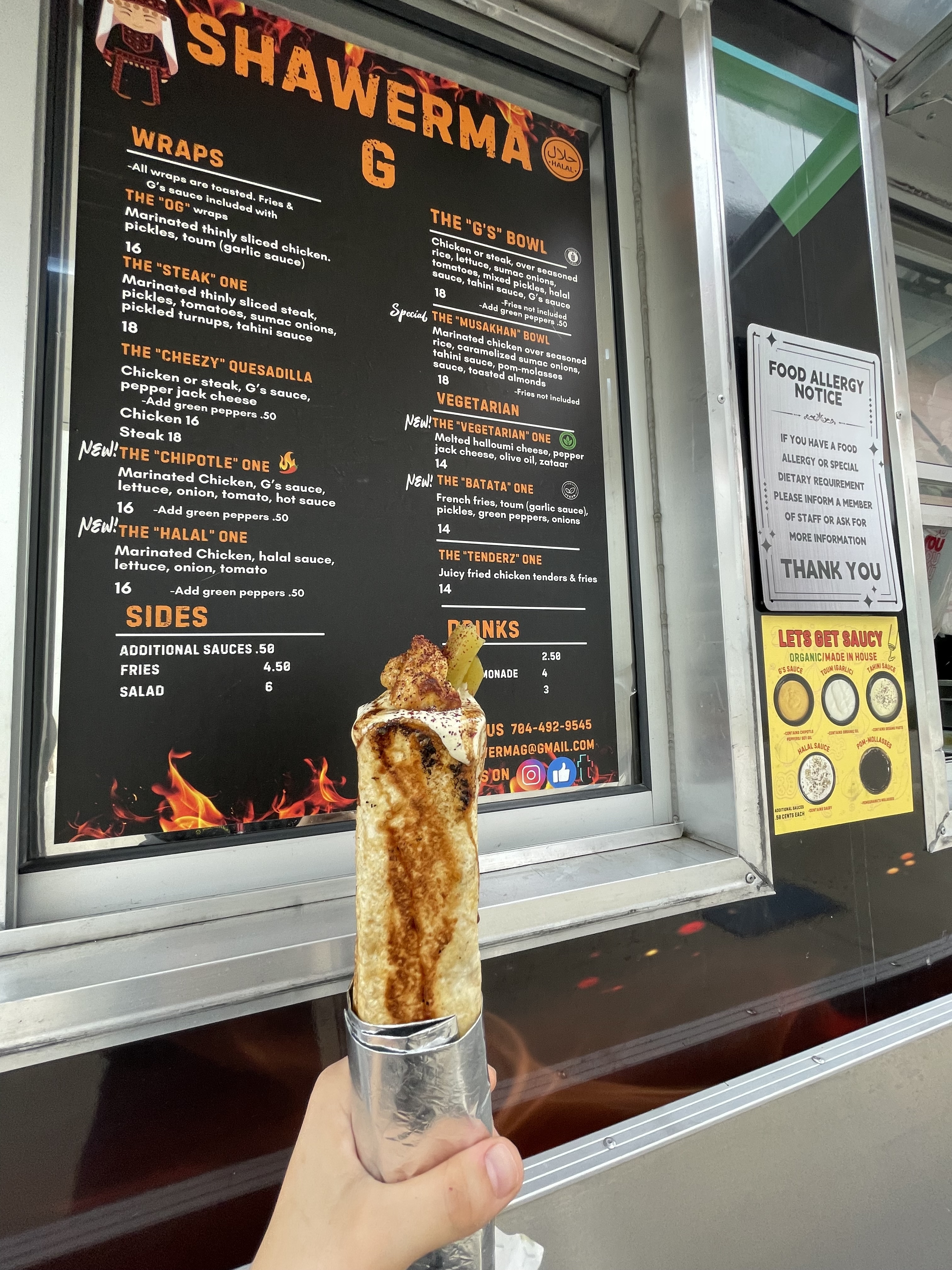 Shawerma wrap in front of the truck window